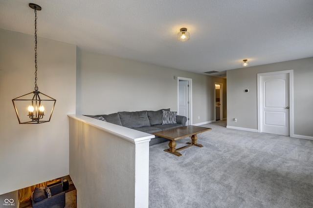 19187 Outer Bank Rd, Noblesville, IN 46062 - living area featuring a chandelier, carpet floors, and baseboards