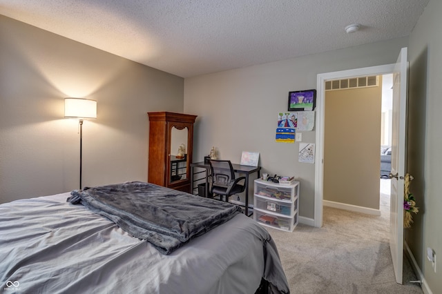 19187 Outer Bank Rd, Noblesville, IN 46062 - carpeted bedroom with a textured ceiling