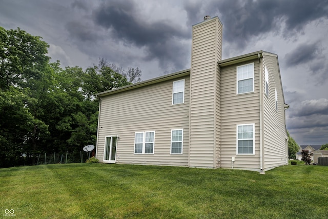 19187 Outer Bank Rd, Noblesville, IN 46062 - back of property featuring a chimney and a lawn