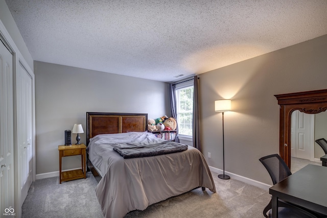 19187 Outer Bank Rd, Noblesville, IN 46062 - bedroom with light carpet, a textured ceiling, and baseboards