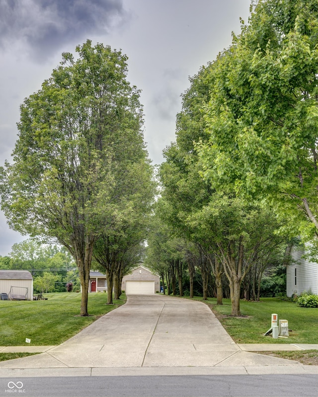 19187 Outer Bank Rd, Noblesville, IN 46062 - view of front of house with a front lawn, an outdoor structure, and a detached garage