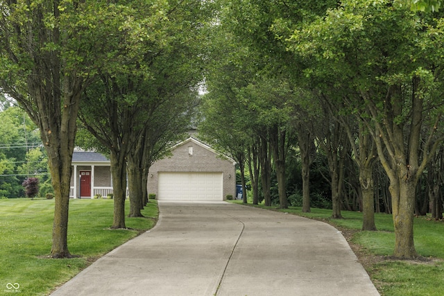 19187 Outer Bank Rd, Noblesville, IN 46062 - obstructed view of property featuring driveway, a front yard, and a garage