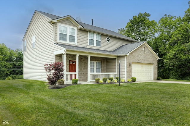 19187 Outer Bank Rd, Noblesville, IN 46062 - view of front of home featuring a porch, a garage, concrete driveway, brick siding, and a front lawn