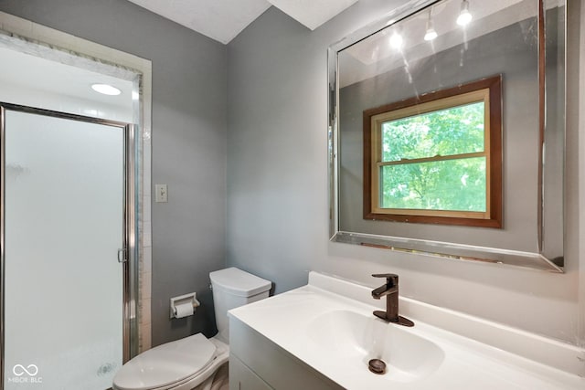 955 Wood Creek Pl, Greenwood, IN 46142 - bathroom featuring toilet, vanity, and a shower stall