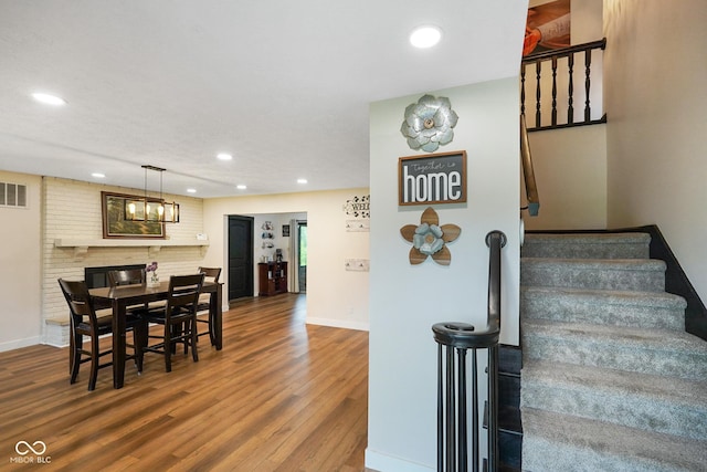 955 Wood Creek Pl, Greenwood, IN 46142 - stairs with recessed lighting, wood finished floors, and baseboards