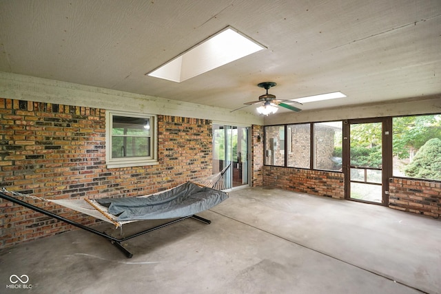 955 Wood Creek Pl, Greenwood, IN 46142 - unfurnished sunroom with a skylight and ceiling fan
