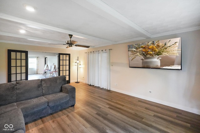 955 Wood Creek Pl, Greenwood, IN 46142 - living room with crown molding, wood finished floors, baseboards, beamed ceiling, and ceiling fan