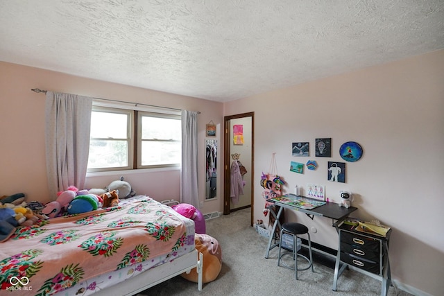955 Wood Creek Pl, Greenwood, IN 46142 - carpeted bedroom with a textured ceiling