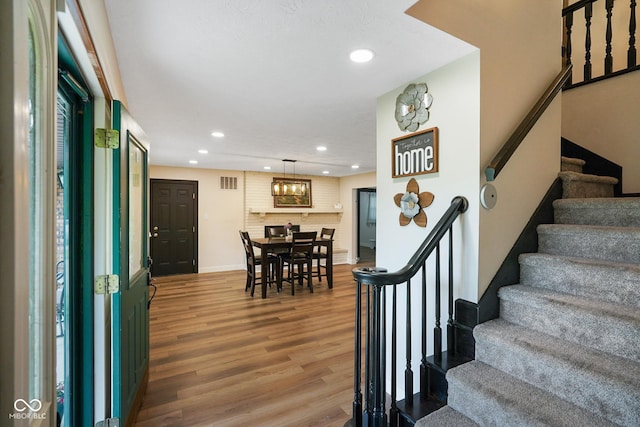 955 Wood Creek Pl, Greenwood, IN 46142 - entrance foyer with recessed lighting, wood finished floors, stairs, and baseboards