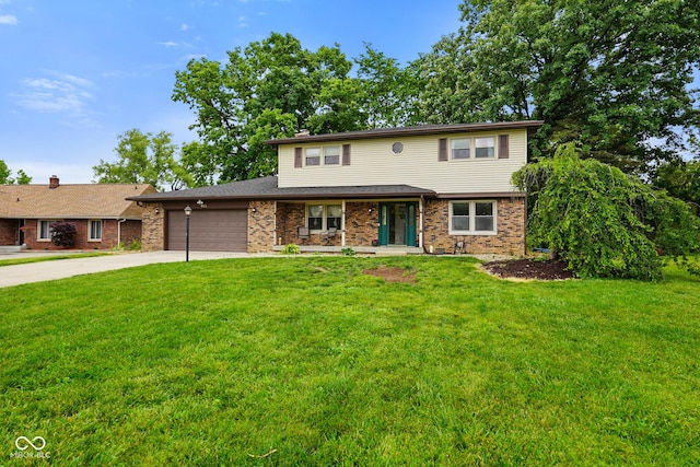 955 Wood Creek Pl, Greenwood, IN 46142 - view of front facade with a garage, driveway, and a front yard