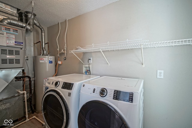 12382 Cool Winds Way, Fishers, IN 46037 - washroom featuring water heater, washer and dryer, and heating unit