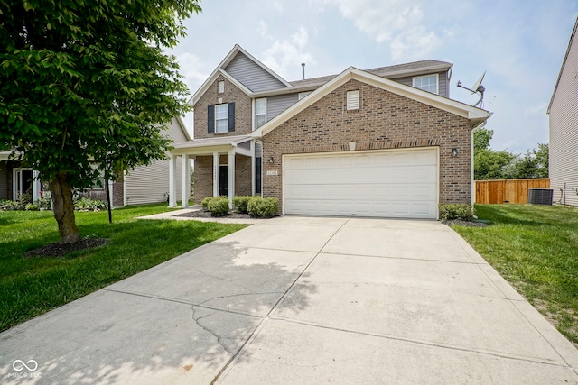 12382 Cool Winds Way, Fishers, IN 46037 - traditional home with brick siding, cooling unit, concrete driveway, and an attached garage