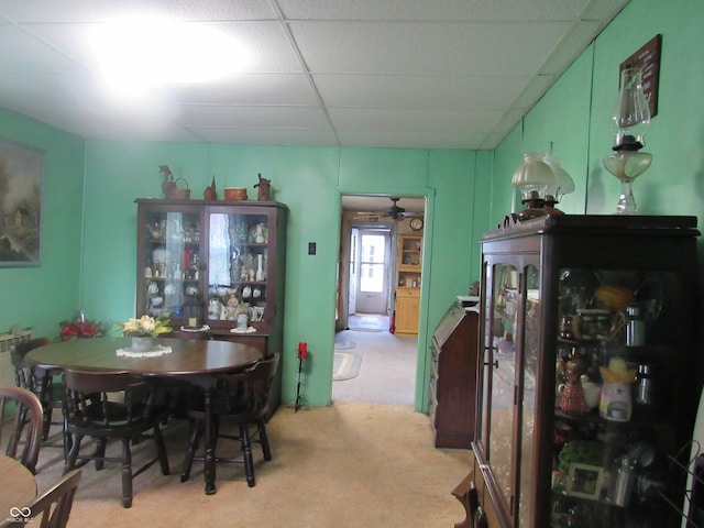 112 Orchard St, Waynetown, IN 47990 - dining space featuring light carpet, a ceiling fan, and a paneled ceiling