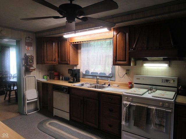 112 Orchard St, Waynetown, IN 47990 - kitchen featuring white range with electric stovetop, a sink, dishwashing machine, and light countertops