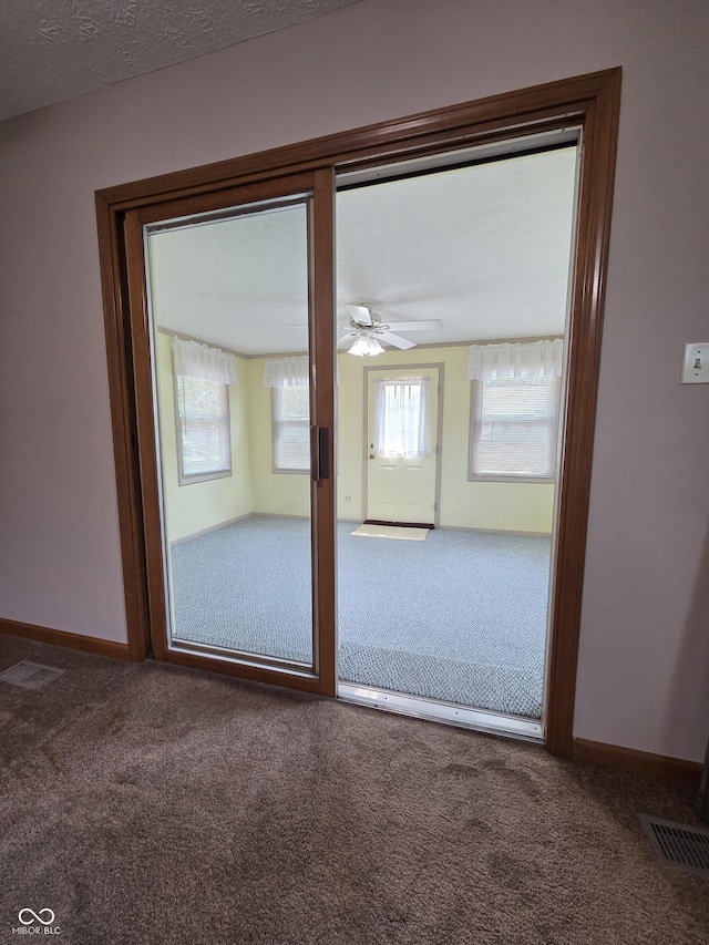1201 Briarwood Dr, Brownsburg, IN 46112 - spare room featuring carpet flooring and a ceiling fan