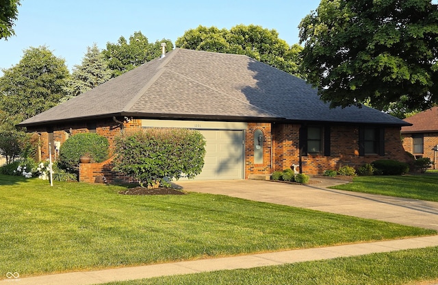 1201 Briarwood Dr, Brownsburg, IN 46112 - view of front of home with brick siding, an attached garage, driveway, and a front lawn