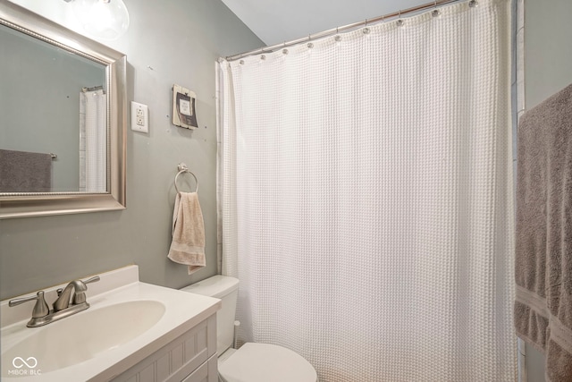 5435 E 10th St, Indianapolis, IN 46219 - bathroom featuring toilet, vanity, and a shower with curtain
