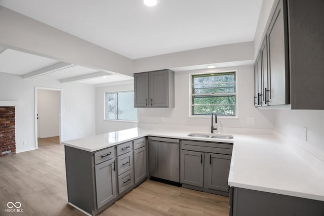 3148 Arbutus Dr, Indianapolis, IN 46224 - kitchen with dishwasher, gray cabinets, a sink, a peninsula, and beam ceiling