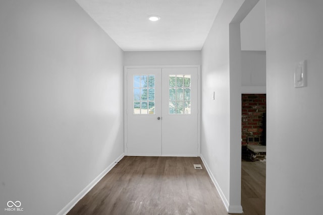 3148 Arbutus Dr, Indianapolis, IN 46224 - hallway with wood finished floors and baseboards
