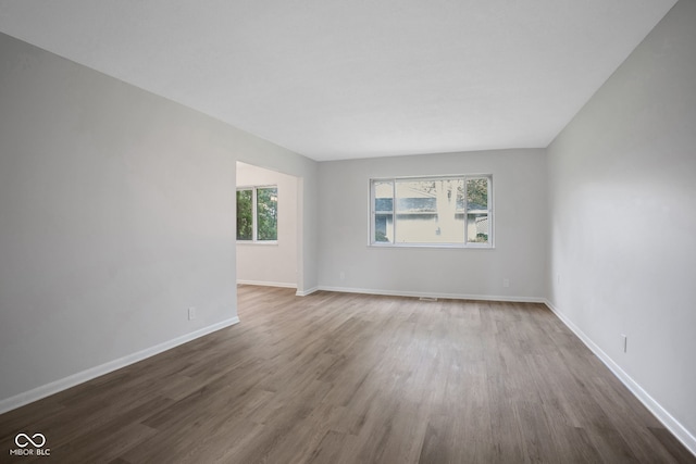 3148 Arbutus Dr, Indianapolis, IN 46224 - empty room with dark wood-style floors and baseboards
