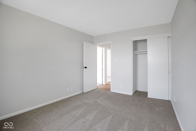 3148 Arbutus Dr, Indianapolis, IN 46224 - unfurnished bedroom with carpet floors, baseboards, and a closet
