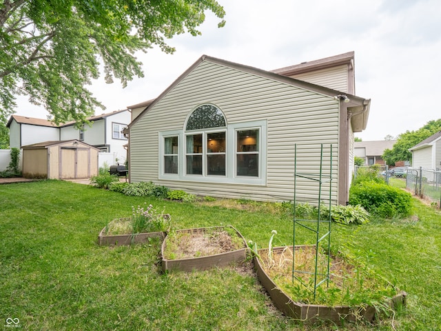 4382 Castlebay Way, Indianapolis, IN 46254 - rear view of property featuring a garden
