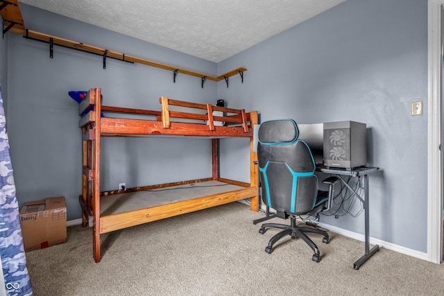 5811 Simmul Cir, Indianapolis, IN 46221 - carpeted bedroom with baseboards and a textured ceiling