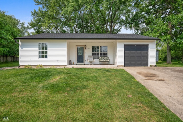 5811 Simmul Cir, Indianapolis, IN 46221 - view of front of property with an attached garage, driveway, and a front yard