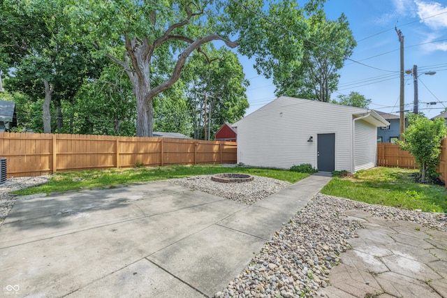 2831 N Talbott St, Indianapolis, IN 46205 - view of patio featuring a fire pit and an outdoor structure
