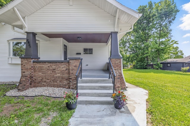2831 N Talbott St, Indianapolis, IN 46205 - view of front facade with a front lawn and a porch