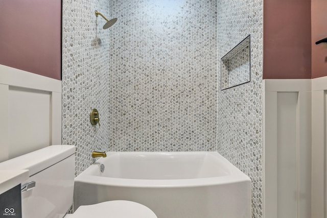 2831 N Talbott St, Indianapolis, IN 46205 - full bathroom with toilet, shower / bathtub combination, and tile walls