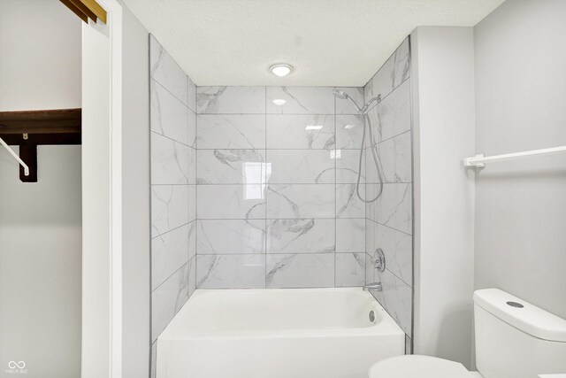 8545 La Corrida Ct, Indianapolis, IN 46227 - full bath with toilet, shower / bathtub combination, and a textured ceiling