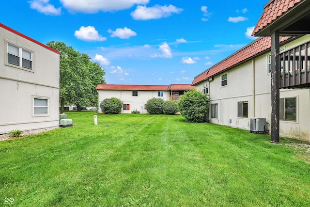 8545 La Corrida Ct, Indianapolis, IN 46227 - view of grassy yard with central AC unit