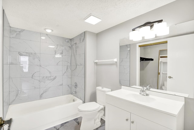 8545 La Corrida Ct, Indianapolis, IN 46227 - full bathroom featuring toilet, a textured ceiling, marble look tile flooring, tub / shower combination, and vanity