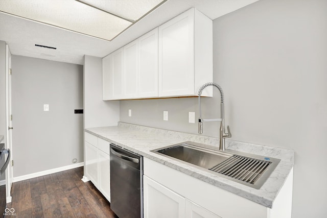 8545 La Corrida Ct, Indianapolis, IN 46227 - kitchen with dishwasher, a sink, dark wood finished floors, white cabinets, and baseboards