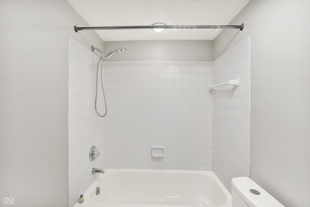8545 La Corrida Ct, Indianapolis, IN 46227 - full bathroom with toilet, shower / bathtub combination, and a textured ceiling