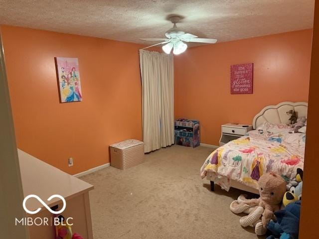 1711 Jaques Dr, Lebanon, IN 46052 - bedroom with carpet, a textured ceiling, a ceiling fan, and baseboards