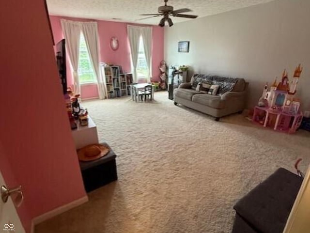 1711 Jaques Dr, Lebanon, IN 46052 - living room featuring carpet floors, a textured ceiling, and ceiling fan