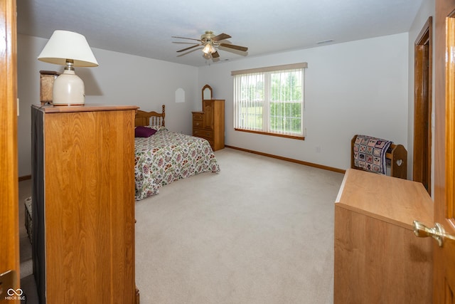 7632 Sea Crest Way N, Noblesville, IN 46062 - bedroom with light colored carpet, baseboards, and a ceiling fan