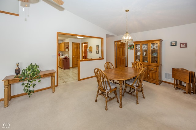 7632 Sea Crest Way N, Noblesville, IN 46062 - dining space featuring lofted ceiling, baseboards, light colored carpet, a chandelier, and a ceiling fan