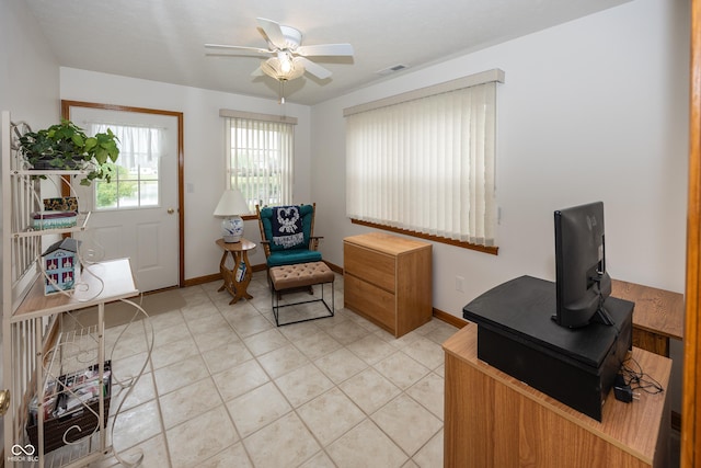 7632 Sea Crest Way N, Noblesville, IN 46062 - living area featuring a ceiling fan, baseboards, and light tile patterned floors