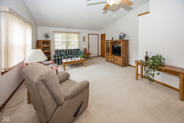7632 Sea Crest Way N, Noblesville, IN 46062 - living room with lofted ceiling, baseboards, light colored carpet, ceiling fan, and a fireplace