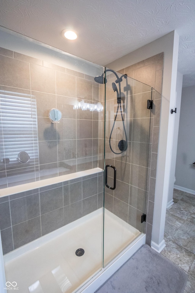 1981 Turning Leaf Dr, Franklin, IN 46131 - bathroom featuring a stall shower, recessed lighting, and baseboards