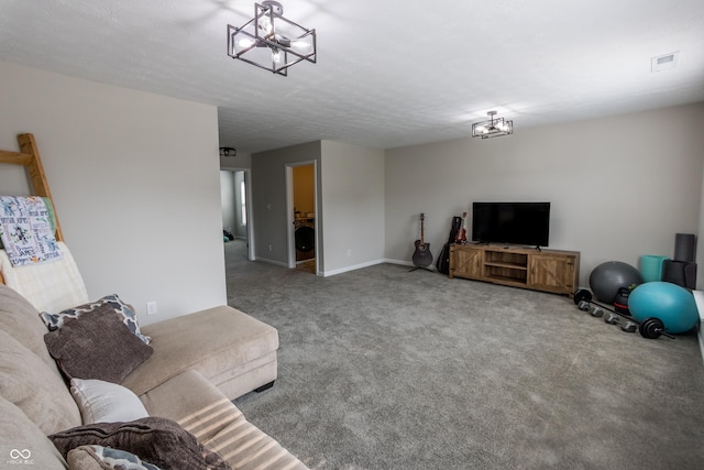 1981 Turning Leaf Dr, Franklin, IN 46131 - living area with carpet, a chandelier, washer / dryer, and baseboards