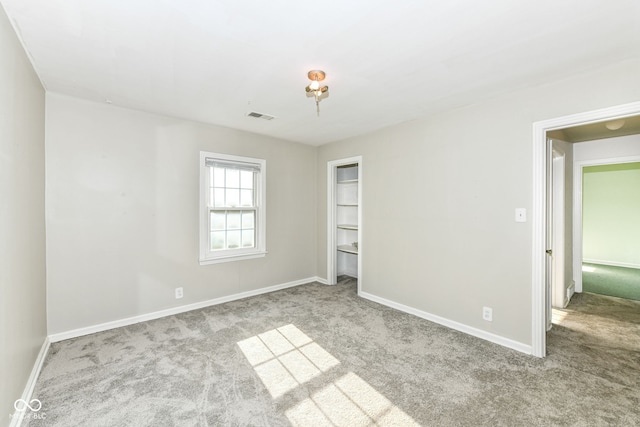 713 W Cromer Ave, Muncie, IN 47303 - unfurnished bedroom featuring carpet flooring