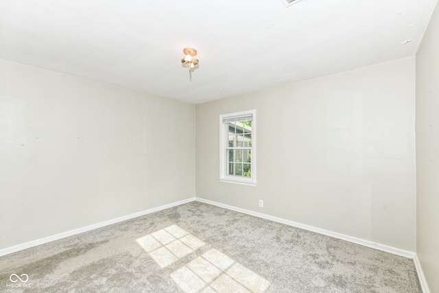 713 W Cromer Ave, Muncie, IN 47303 - carpeted spare room featuring baseboards