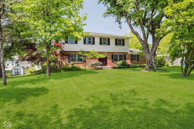 6146 Rucker Rd, Indianapolis, IN 46220 - colonial house with a storage shed, brick siding, and a front yard
