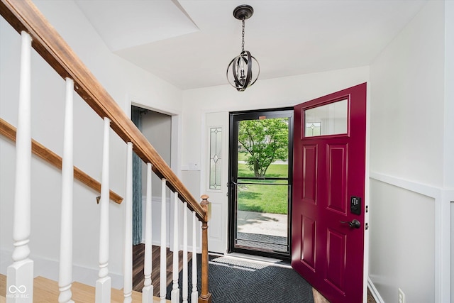 6146 Rucker Rd, Indianapolis, IN 46220 - foyer featuring stairway and light wood-type flooring
