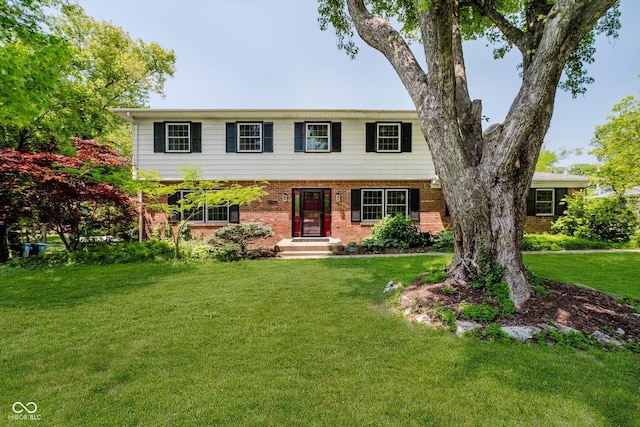 6146 Rucker Rd, Indianapolis, IN 46220 - view of front of home featuring brick siding and a front yard