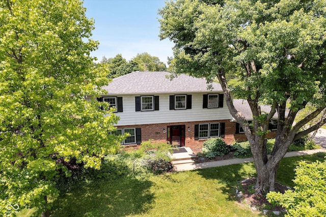6146 Rucker Rd, Indianapolis, IN 46220 - view of front of house with brick siding and a front lawn